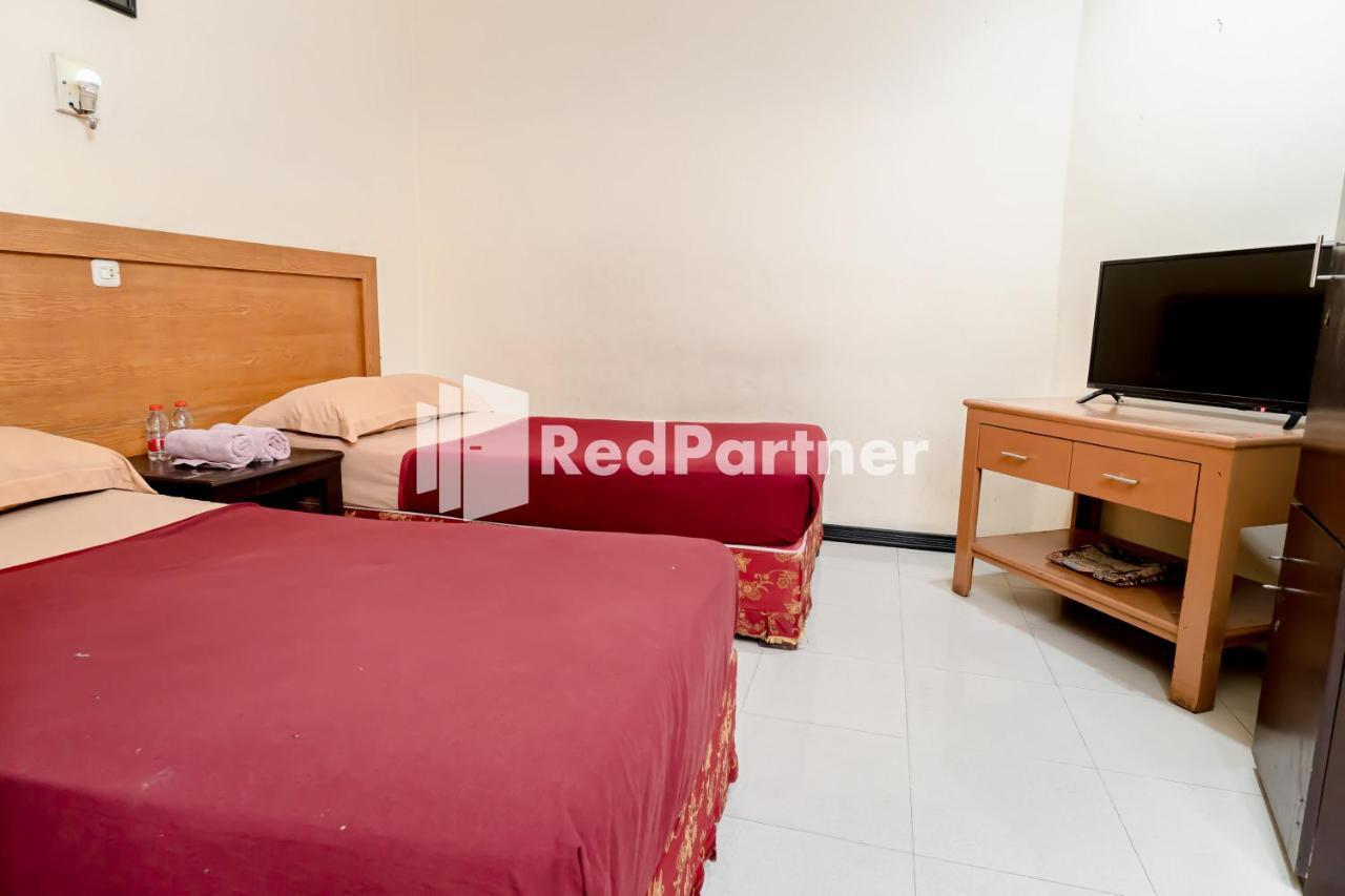 Cherry Pink Hotel Medan Mitra Reddoorz Екстериор снимка